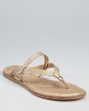 These sophisticated Eileen Fisher sandals showcase subtle glamour in pebbled metallic leather.