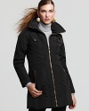 This Andrew Marc down jacket boasts bold zipper details and a waist-cinching belt for on-the-go chic.