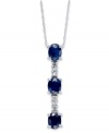 Elegance in the shape of a Y. This stunning pendant features three, oval-cut sapphires (1-3/8 ct. t.w.) with rows of diamond accents in between. Set in 14k white gold. Approximate length 16 inches. Approximate drop: 1 inch.