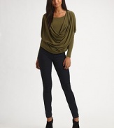 Soft jersey drapes beautifully around the body in a double-layered cowlneck silhouette.Scoopneck Cowlneck overlay Dropped shoulders Short sleeves over long About 22 from shoulder to hem Rayon Dry clean Made in USA