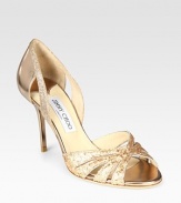 Undeniably chic metallic leather in a classic d'Orsay silhouette, sprinkled in glitz. Lacquered heel, 3½ (90mm)Glitter-coated metallic leather upperLeather lining and solePadded insoleMade in ItalyOUR FIT MODEL RECOMMENDS ordering one half size up as this style runs small. 