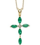 A bold, and colorful!, way to express your faith. This unique cross pendant features marquise-cut emeralds (3/4 ct. t.w.) with diamond accents at the center. Set in 14k gold. Approximate length: 18 inches. Approximate drop: 3/4 inch.