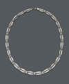 A simple chain with cutting-edge design. Necklace features a Stampato link in 14k white gold. Approximate length: 17 inches.