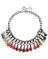 Get under the shades. Haskell's frontal necklace, crafted from hematite-tone mixed metal, makes a colorful statement with faceted beads wrapped in tonal fabrics and cups. Approximate length: 17 inches + 3-inch extender. Approximate drop: 1-3/4 inches.