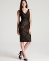 In asymmetric paneled lace, this ML Monique Lhuillier dress lends timeless glamour.