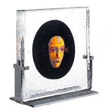 In the world of designer Bertil Vallien, we meet the inner beauty of glass. In his Black Elements collection we encounter hand-painted glass heads encapsulated in solid blocks of glass.