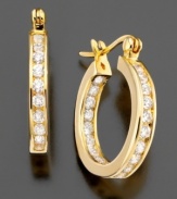 Elegant and eye-catching, these classic hoop earrings by B. Brilliant glisten with plentiful cubic zirconias (2-1/3 ct. t.w.) set in 18k gold over sterling silver. Approximate diameter: 1/2 inch.