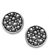 Punch up your look with a ton of sparkle. Studio Silver's pretty stud earrings feature a sterling silver setting with round-cut marcasite at the center. Approximate diameter: 2-1/2 inches.