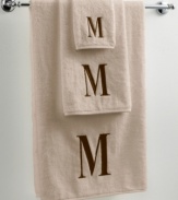 Dry off in your signature style with monogrammed towels from Avanti. Embroidered with a single capital letter in Bodoni font, this combed cotton fingertip towel makes it easy to personalize your bath.