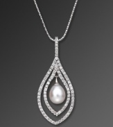 Encircled by sparkling cubic zirconias (7/8 ct. t.w.) and set in platinum over sterling silver, CRISLU's freshwater pearl pendant necklace (6-1/2 to 8 mm) makes a stunning statement. Approximate length: 16 inches + 2-inch extender. Approximate drop: 2 inches.