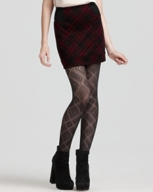 Classic argyle gets a modern update with this Free People skirt featuring stretch panels at the sides for a body-con fit that flaunts your lithe silhouette. Textured tights and chunky knits create a season of lavish looks.