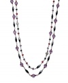 Polished to perfection. Purple Belle de Jour glass beads are the focal point in this pretty, Lauren by Ralph Lauren Necklace. Two row design crafted in mixed metal. Approximate length: 32 inches.