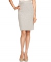 Calvin Klein gives a tweed skirt a springtime twist with a linen and cotton blend and a slim-fitting silhouette.