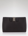 A signature grosgrain bow lends polished sophistication to Salvatore Ferragamo's satin mini bag.