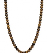 A lovely gradation of neutral hues. This beautiful strand necklace features tiger's eye beads (190 ct. t.w.) in a polished 14k gold setting. Approximate length: 18 inches. Approximate bead diameter: 8-9 mm.