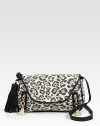 Bold leopard-print highlights this flap-front canvas bag, offset by a leather tassel and trim.Adjustable shoulder strap, 14½-15½ dropFlap snap closureTwo outside zip pocketsCotton lining10W X 6½H X 1¾DImported