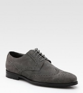 The timeless wingtip style returns in suede with perforated detail and a supremely comfortable, lightweight lug sole. Leather lining Rubber sole Imported 