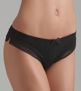 A silky soft thong with ornate lace detail along legs.