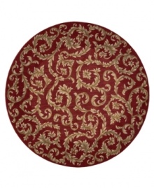 Evoking the opulence of European decor, this round rug features an elegant floral scroll pattern in gold against a rich russet ground, subtly framed in burgundy. The premium wool weave imparts rich texture and indulgent softness.