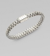 A mid-sized, intricately woven sterling silver chain design. Sterling silver Push clasp closure Length, about 6½ Imported 