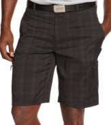 Extend your solid style from the green to your gear with these plaid shorts from Greg Norman for Tasso Elba.