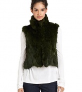 THE LOOKPlush pieced rabbit furStand collarConcealed hook-and-bar closureSleevelessDual front slash pocketsTHE FITAbout 21 from shoulder to hemTHE MATERIALDyed rabbit furFully linedCARE & ORIGINDry clean by fur specialistImportedFur origin: ChinaModel shown is 5'11 (180cm) wearing US size Small. 