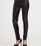 Wear now and love forever-- these lustrous leather leggings have modern contrast panels and a secure elastic waistband. Elastic waistbandRise, about 7Inseam, about 33Body: Lamb leather; Contrast: 85% polyester/15% spandexDry cleanImported of Italian fabricModel shown is 5'10 (177cm) wearing US size 2.