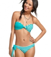 Roxy puts a new twist on the bikini bottom with a solid and stripe mix – plus a sexy side tie!