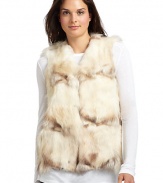 THE LOOKPlush dyed raccoon fur constructionHook-and-eye closureTHE FITAbout 23 from shoulder to hemTHE MATERIALRaccoon furFully linedCARE & ORIGINClean by fur specialistFur origin: USAMade in USAModel shown is 5'9½ (176cm) wearing US size Small. 