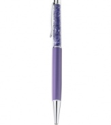 The write touch. Swarovski's pen, with silver-tone and purple details, is filled with tanzanite crystals for a sparkling statement. Item comes packaged in a velvet pouch. Black ink. Approximate size: 5-3/5 x 4/10 inches.