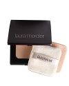 Laura Mercier Foundation Powder can be applied dry with a puff to reduce shine or as a touch-up over a liquid foundation or Tinted Moisturizer. Apply it wet with the enclosed sponge & it will offer more coverage than a liquid foundation for a true soft focus appearance. Compact contains sponge and puff. Offers the most coverage out of all Laura Mercier's foundations.