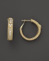 Elegant hoop earrings in 18K yellow gold accented with diamonds. From Judith Ripka.