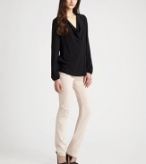 Long bishop sleeves accentuate this slightly slouched cowlneck. CowlneckLong bishop sleevesLong sleevesRibbed cuffsLonger length hits below the hipsRayonDry cleanImported of Italian fabric