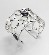 From the Regitze Collection. A striking, sculptural open cuff formed of cutout circles of gleaming sterling silver, dotted with discs of rich black agate.Black agateSterling silverDiameter, about 2¼Width, about 1¾Imported