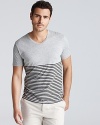 An emboldened basic from Vince--this striped, color block t-shirt is an essential wardrobe staple.