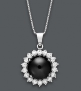 A traditional design in sweet, contrasting color. This stunning pendant highlights an onyx gemstone (10 mm) surrounded by round-cut white topaz (1 ct. t.w.). Set in sterling silver. Approximate length: 18 inches. Approximate drop: 3/4 inch.