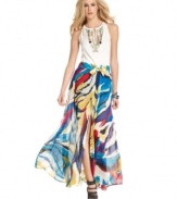 A brightly bold abstract-animal print makes a summer statement on this Andrew Charles maxi skirt -- elevate it with platforms for soiree style!