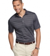 Come out swinging. Gear yourself for a great game with this striped shirt from Greg Norman that features moisture management to keep you at the top of your game.