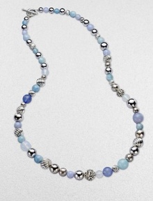 From the Elements Collection. A long-enough-to-double strand combines beads of sterling silver, blue chalcedony, aquamarine and moon quartz in an artful array of textures, sizes and shades.Blue chalcedony, aquamarine and moon quartzSterling silverLength, about 36Cable toggle claspImported