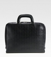 Single gusset briefcase crafted from gancini stamped calfskin leather featuring a removable, inside computer pocket to secure your investment in style.Zip closureDouble top handlesInterior pocketsLeather15W x 11H x 2DMade in Italy