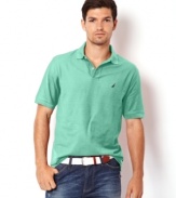 Add some polish to your casual look with this bright preppy polo shirt from Nautica.