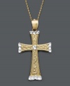 A versatile two tone cross pendant in design to last a lifetime. Crafted in 14k gold and 14k white gold, cross features an engraved scroll pattern and diamond-cut accents. Approximate length: 18 inches. Approximate drop width: 1 inch. Approximate drop length: 1-1/2 inches.