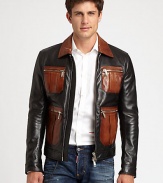 Two shades of supple leather, tailored in a bomber style and finished with bold zipper details.Point collarZip frontZipper patch pocketsZipper cuffsAbout 24 from shoudler to hemLeatherDry clean by leather specialistImported