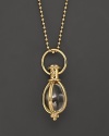 Oval rock crystal amulet. Designed by Temple St. Clair.