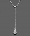 A luminous single teardrop of clear crystals makes a romantic statement on this fine necklace. In silvertone rhodium plated mixed metal. Chain measures approximately 16 inches; drop measures approximately 2 inches.