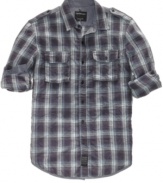 Roll up your sleeves and greet the weekend in this can't-miss plaid shirt from Calvin Klein