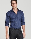 The blue's never felt so good. This sleek BOSS Black stripe shirt lights up your off-hours look.