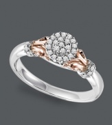 Unique by design. Create the perfect proposal with this exquisite diamond engagement ring. Crafted in sterling silver with 14k rose gold accents at the shoulders, ring features round-cut diamonds (1/6 ct. t.w.) in a circular pattern. Sizes 5-8.