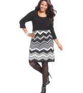 Conquer the cold in style with Spense's plus size sweater dress.