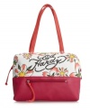 A fresh floral print with rocker-chic accents, this traffic-stopping tote by Ed Hardy is sure to turn heads. Sparkling rhinestones decorate signature front logo on floral detailed canvas.